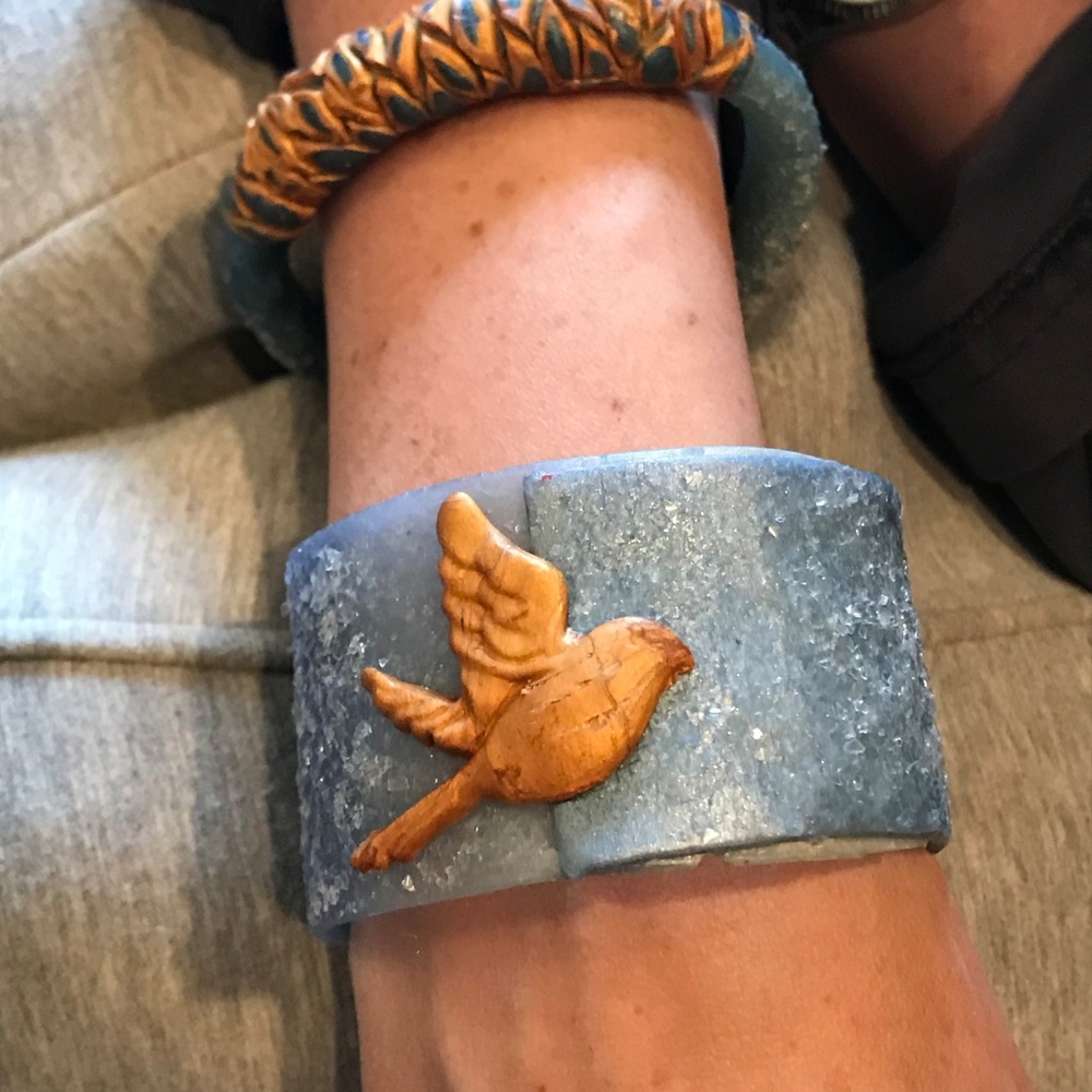 Matana chasing a feather Bird bangle in Denim - Picture 5 of 8